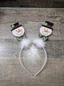 Addobbo per capelli cerchietto natalizio pupazzo di neve bianco colorato piuma  - Foto 1 di 4