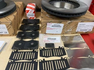 2005-2023 TOYOTA TACOMA 4WD GENUINE OEM FRONT BRAKE ROTORS TCMC PADS & SHIM KIT - Picture 1 of 5