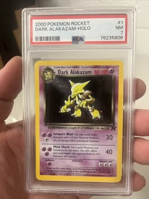 Pokémon Dark Alakazam 1/82 Unlimited Holo Rare Graded PSA 7 - Image 1 of 3