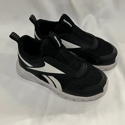 Zapatillas deportivas Reebok negras blancas sin cordones para niños pequeños talla 8 Foto 1 de 4