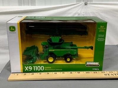 John Deere X9 1100 PRESTIGE Combine w / Corn Head & Draper 1:64 NIB Ertl 2021 - Image 1 of 4
