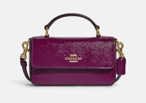 Bolso Bandolera COACH #CE630 Mini Josie Charol Asa Superior - Magenta Oscuro - Imagen 1 de 13
