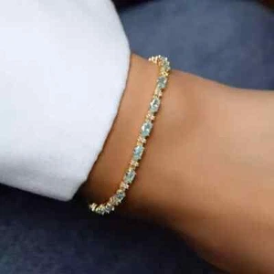 8Ct Lab Created Aquamarine Oval Women's TennisBracelet 14K Yell Gold Plated 7.5" - Picture 1 of 5