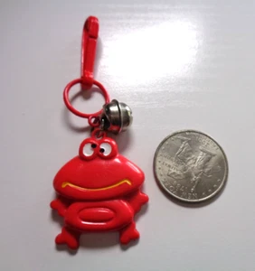 VTG 80s Plastic Bell Charm Red Crazy Frog Clip On Charm with Yellow Smile - Picture 1 of 6