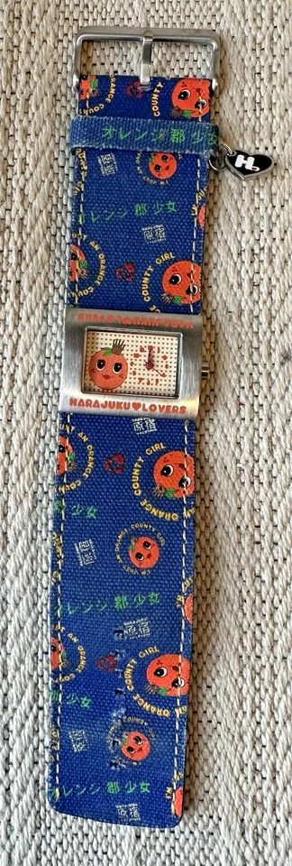 RELOJ HARAJUKU LOVERS GWEN STEFANI NARANJA COUNTY GIRL VESTAL Foto 1 de 1