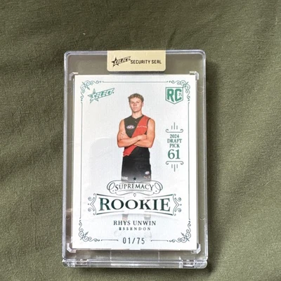 2025 Supremacy Rookie Blue Foil Rhys Unwin Essendon Bombers RPB61 #01/75. - image 1 of 2