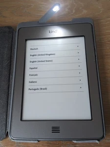Amazon Kindle Touch bundle with leather case 6" eReader (D01200) 3G + Wi-Fi - Picture 1 of 8