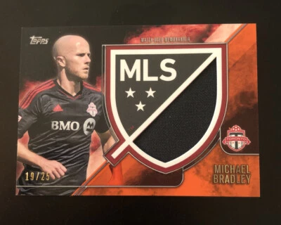 2015 Michael Bradley /25 Topps MLS Relic Orange Crest Patch - Toronto FC - Image 1 of 2