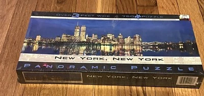 Puzzle panorámico Nueva York, Nueva York BRILLA EN LA OSCURIDAD.  Marca Buffalo 750 piezas Foto 1 de 2