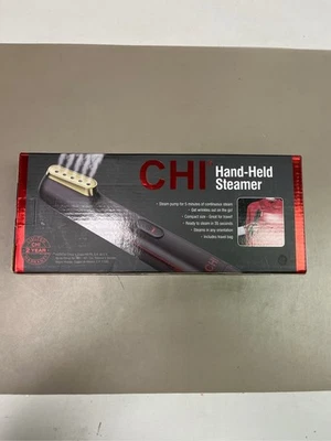 Vaporizador de ropa portátil Foto 1 de 3