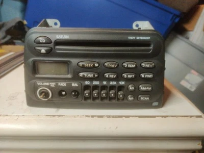 OEM Part# 21023038 1997-1998 Saturn Factory Radio AM/FM/CD - Image 1 of 4