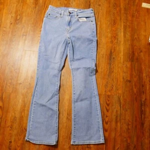 Jeans Levis 725 tiro alto bootcut para mujer 28 (28x29) elásticos lavado claro denim - Imagen 1 de 6