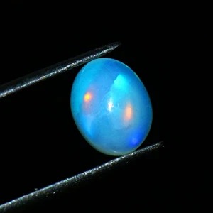 Ethiopian 1.50 Cts Color play white Opal Oval Cabochon Loose Gemstone 9x7x4 mm - Picture 1 of 3