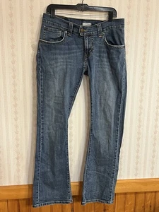 Pantalones de mezclilla Levi’s 542 acampanados bajos para mujer talla 10 lavado medio - Imagen 1 de 11