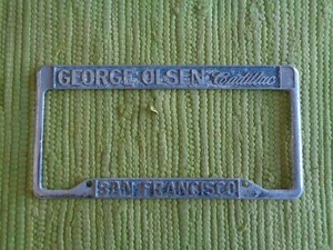 Vintage George Olsen CADILLAC Händler KENNZEICHENRAHMEN San Francisco CA - Bild 1 von 3