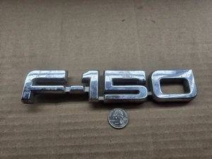 Ford OEM 1987-1991 F-150 guardabarros delantero emblema lateral insignia logotipo nombre E7TB-16B114-AB - Imagen 1 de 7
