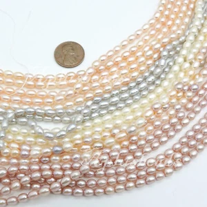 16in. Freshwater Pearl 4-5mm Oval Rice  beads Pink and Peach color - Picture 1 of 3