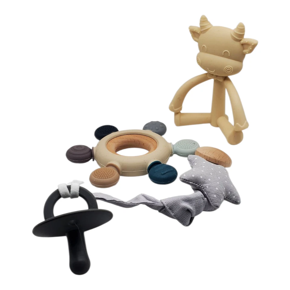 bundle baby teether beige cow,  star pacifier holder w/pacifier, chewing wheel - Image 1 of 4
