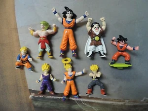 Lotto 8 figurine Dragon Ball in miniatura Goku Trunks Brolly Mr. Satan RARO anni 80 90 - Foto 1 di 7