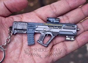 1/12 Mini Pistola Cyber Horizon Strike-Rifle de Balística Adaptativa Llavero 9cm - Imagen 1 de 3