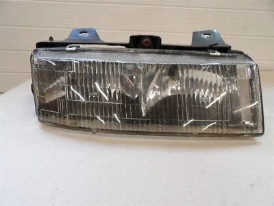 CONJUNTO FARO LATERAL PASAJERO DERECHO CHEVY CORSICA TEMPEST 89 CON SOPORTE DE MONTAJE Foto 1 de 4