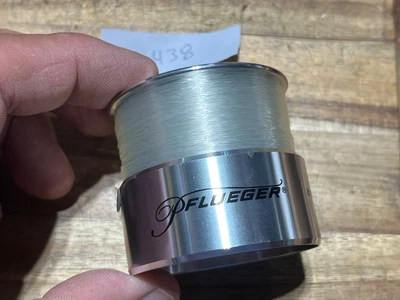 Pflueger Supreme fishing reel spool with new line (26438) - Image 1 of 4