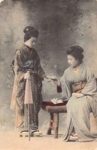Japan - Two geishas enjoying a cup of tea - Picture 1 of 2