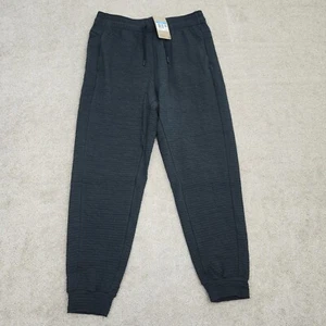 Pantalones de yoga Nike Dri-FIT medianos altos texturizados cónicos negros DV9885-010 - Imagen 1 de 11