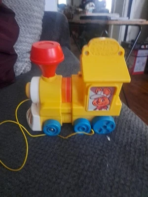 Vintage 1980s TOMY Plastic Pull Toy Extending Yellow Train Rabbit Conductor Rare - Image 1 of 4