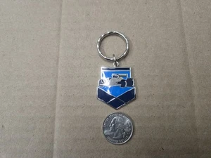 Llavero Indy Race Car Metal Vintage Llavero Anillo Lazo Soporte Logo Insignia  - Imagen 1 de 3