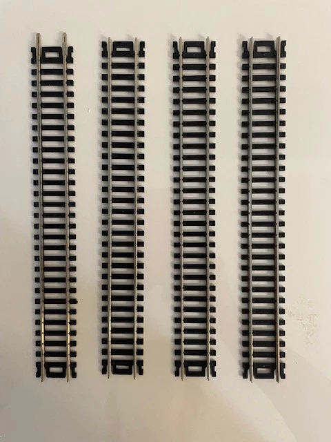 Atlas #150 HO Scale - Code 100 - 9" Straight Track - (Black Ties) 4 pcs bulk - Image 1 of 1