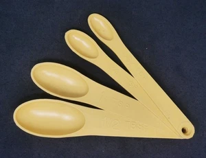 Vintage Yellow Measuring Spoon set of 4. 1/2 TBL, 1 TSP, 1/4 TSP, 1/8 TSP - Picture 1 of 1