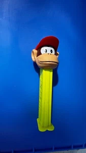 Alter Pez Spender PEZ Figur Nintendo Mario Cart Affe Pezspender Werbung Reklame - Bild 1 von 6