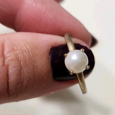 Anillo banda perlas oro 10kt - simple pero elegante  Foto 1 de 4