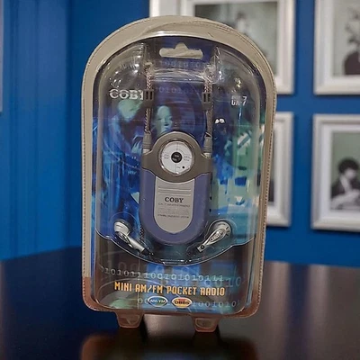 Coby CX-7 Mini AM/FM Pocket Radio with Dynamic Bass Boost System (DBBS)  - Image 1 of 3