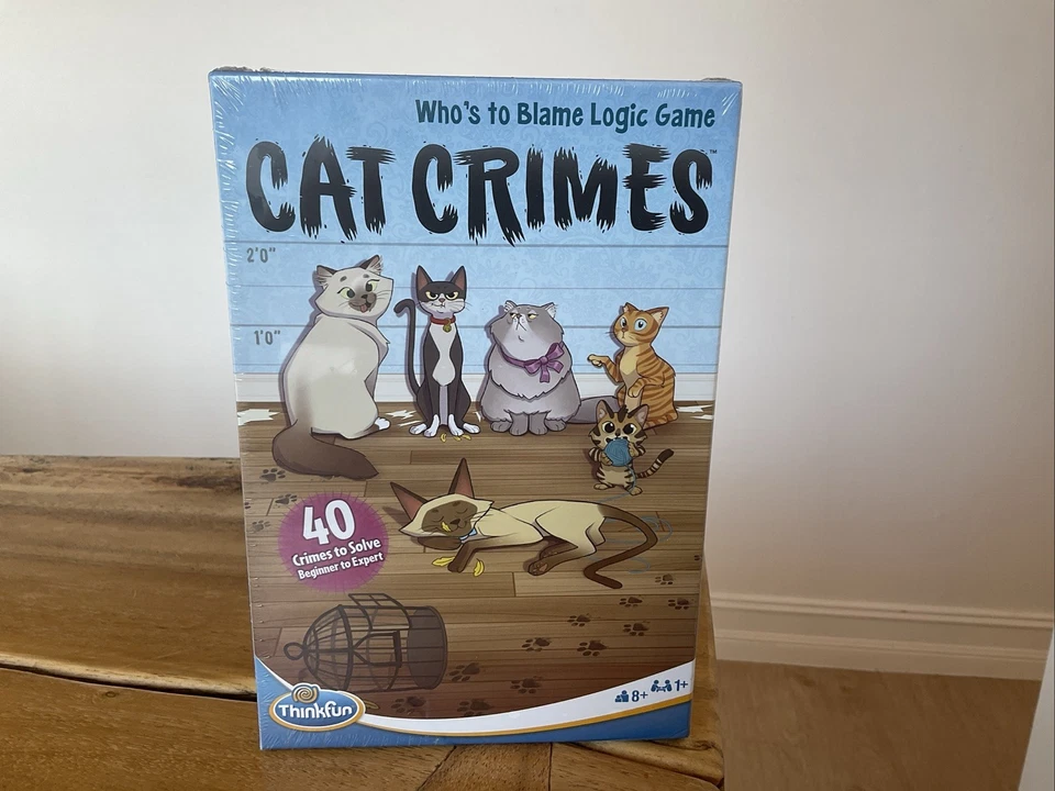 Juego de mesa de lógica ThinkFun Cat Crimes Who's to Blame Foto 1 de 4