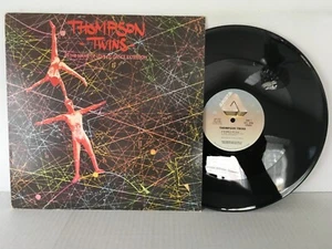 The Thompson Twins - In The Name Of Love - Arista Records PROMO (1982)12" SINGLE - Picture 1 of 2