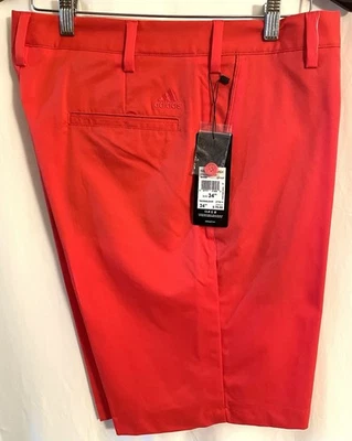 Pantalones cortos de golf Adidas para hombre talla 34. Naranja. Nuevo con etiquetas. Foto 1 de 4
