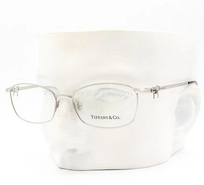 Anteojos Tiffany TF 1099 6047 lazos plateados pulidos 50 mm pequeños sin estuche Foto 1 de 4
