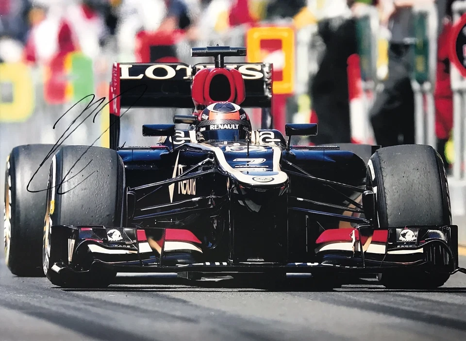 Kimi Raikkonen Hand Signed Lotus 16x12 Photo F1. - Image 1 of 1