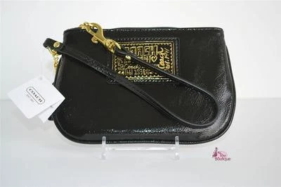 Bolso sin asas Coach muñequera negro charol adorno dorado bolso de maquillaje cartera cartera nuevo Foto 1 de 4