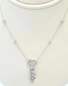 18 Karat Solid White Gold Heart With 0.76 Cts TW Floating Diamonds G Color SI1 - Picture 1 of 3