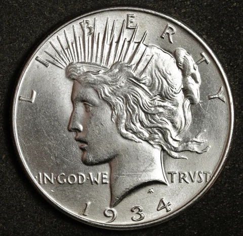 1934 Peace Silver Dollar.  BU.  Inventory H.   164505 Cover