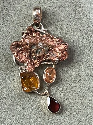 Pepita de cobre resistente corte áspero piedra amarilla y ovalada con rubí lágrima en 925 marcado Foto 1 de 4