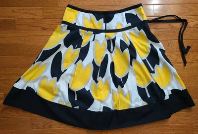 Falda plisada mini estampado de tulipán negro amarillo de Charlotte Russe 100 % algodón talla 7 Foto 1 de 4