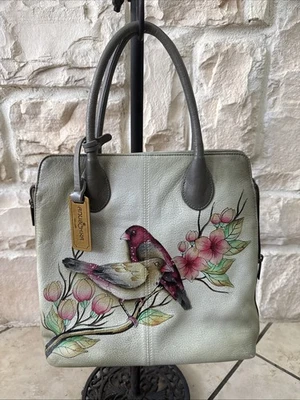 Bolso convertible expandible Anuschka RETIRADO #551-SMT "VUEL TRIST" 12"x11"x4" Foto 1 de 4