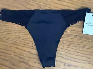NUEVO CON ETIQUETAS Calvin Klein Mujer (X-Pequeño) TANGA DE ENCAJE ULTRA SUAVE CALVIN KLEIN, NEGRO - Imagen 1 de 4