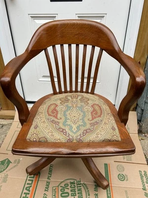Silla vintage giratoria de roble, inclinable, ajustable, con brazo rodante. Foto 1 de 4
