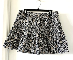 Minifalda ZARA para mujer línea A talla XL negra floral cintura elástica volantes dobladillo - Imagen 1 de 12