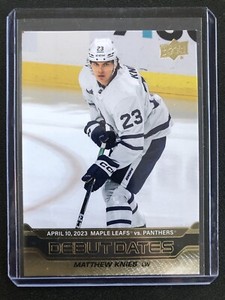 2023-24 Upper Deck Series 1 Hockey Matthew Knies Debut Dates Gold #DD-18